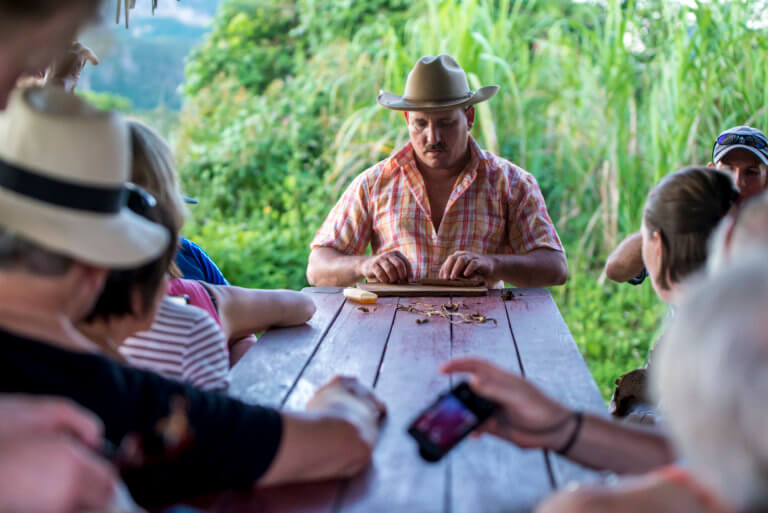 Cuban Man Rolling Cigars