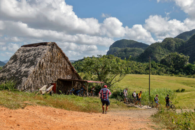 Group of Cyclists in the Cuban Countryside