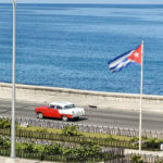 Cuban Car Driving Along the Malecón, HavanaCuban Car Driving Along the Malecón, Havana