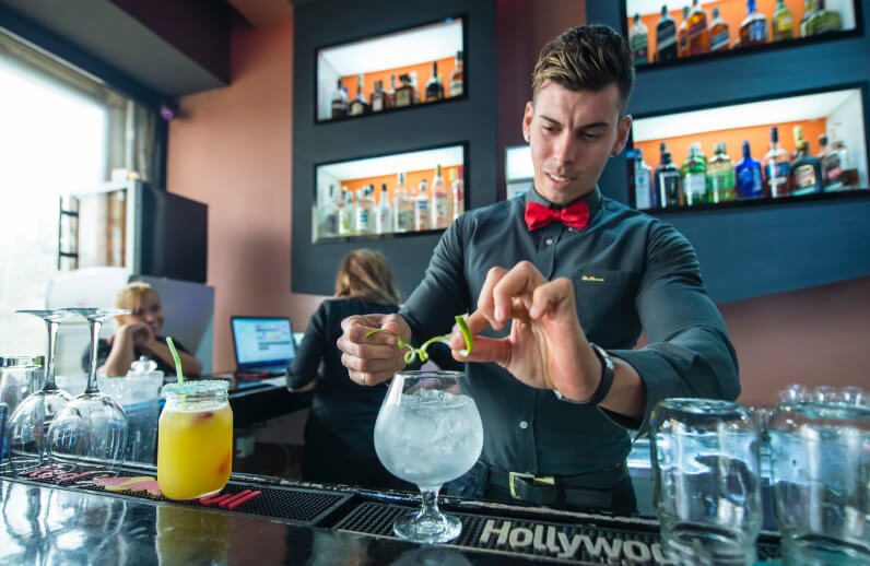 Cuban Bartender Making a Cocktail